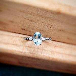 Anillo Oro Blanco 18k con aguamarina y brillantes