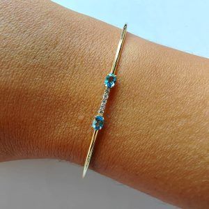 Pulsera oro amarillo 18k y diamantes con topacios azules