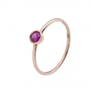 Anillo oro rosa con piedra roja