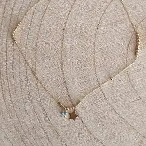 Collar colgante estrella y aguamarina
