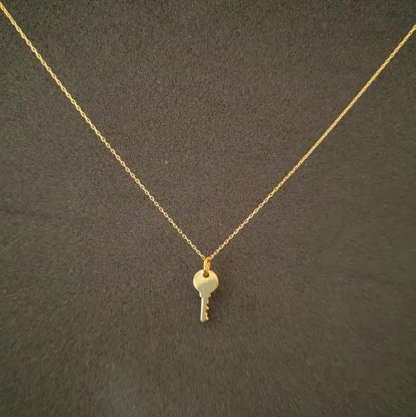 Colgante llave en oro 18k - Imagen 3