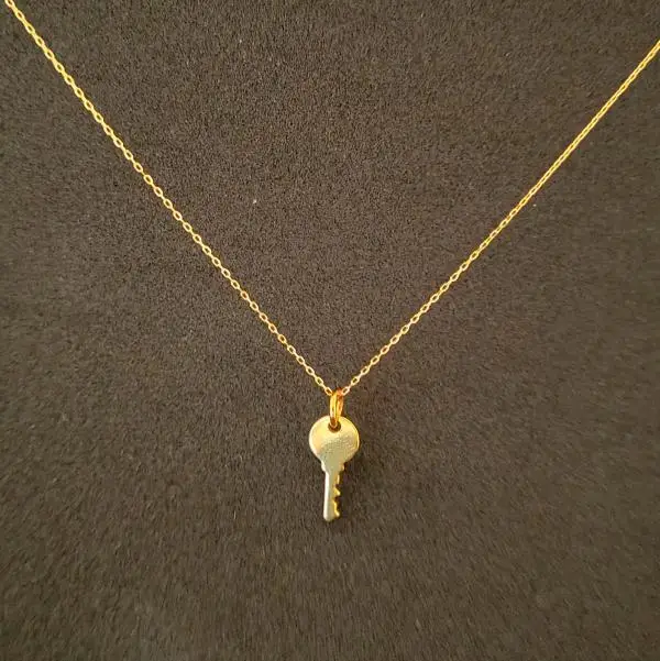 Colgante llave en oro 18k - Imagen 2