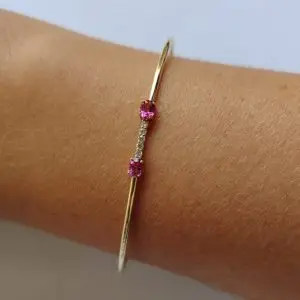 Pulsera oro amarillo 18k y diamantes con topacios rosas